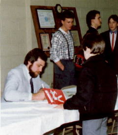 Grand Master James S. Benko autographing books